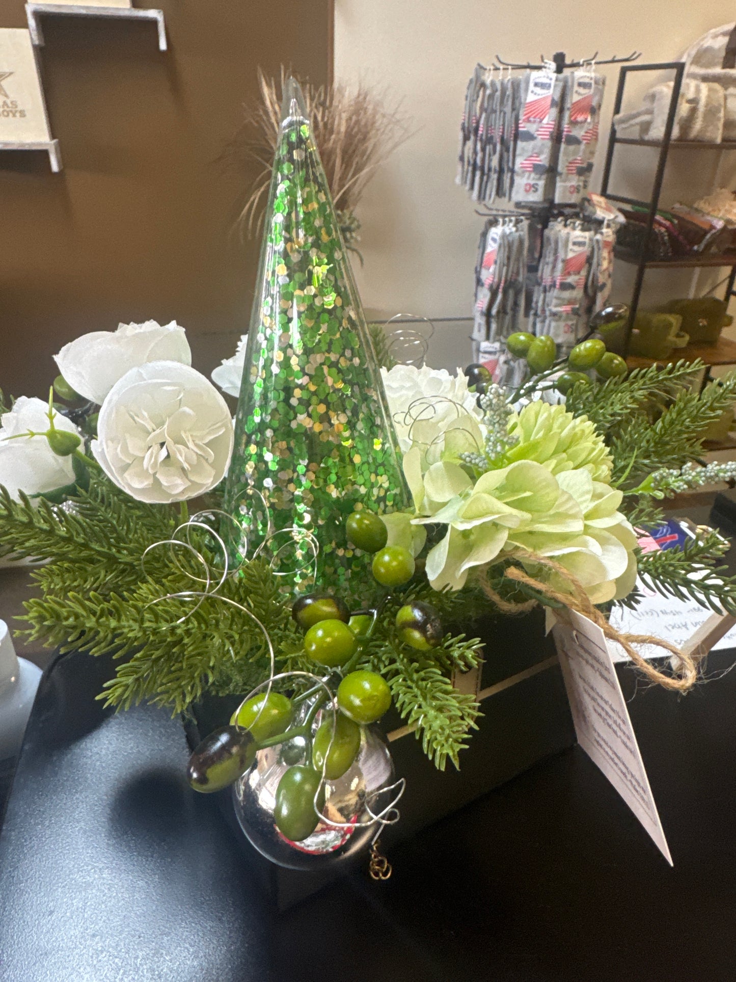Green and white florals in black bag