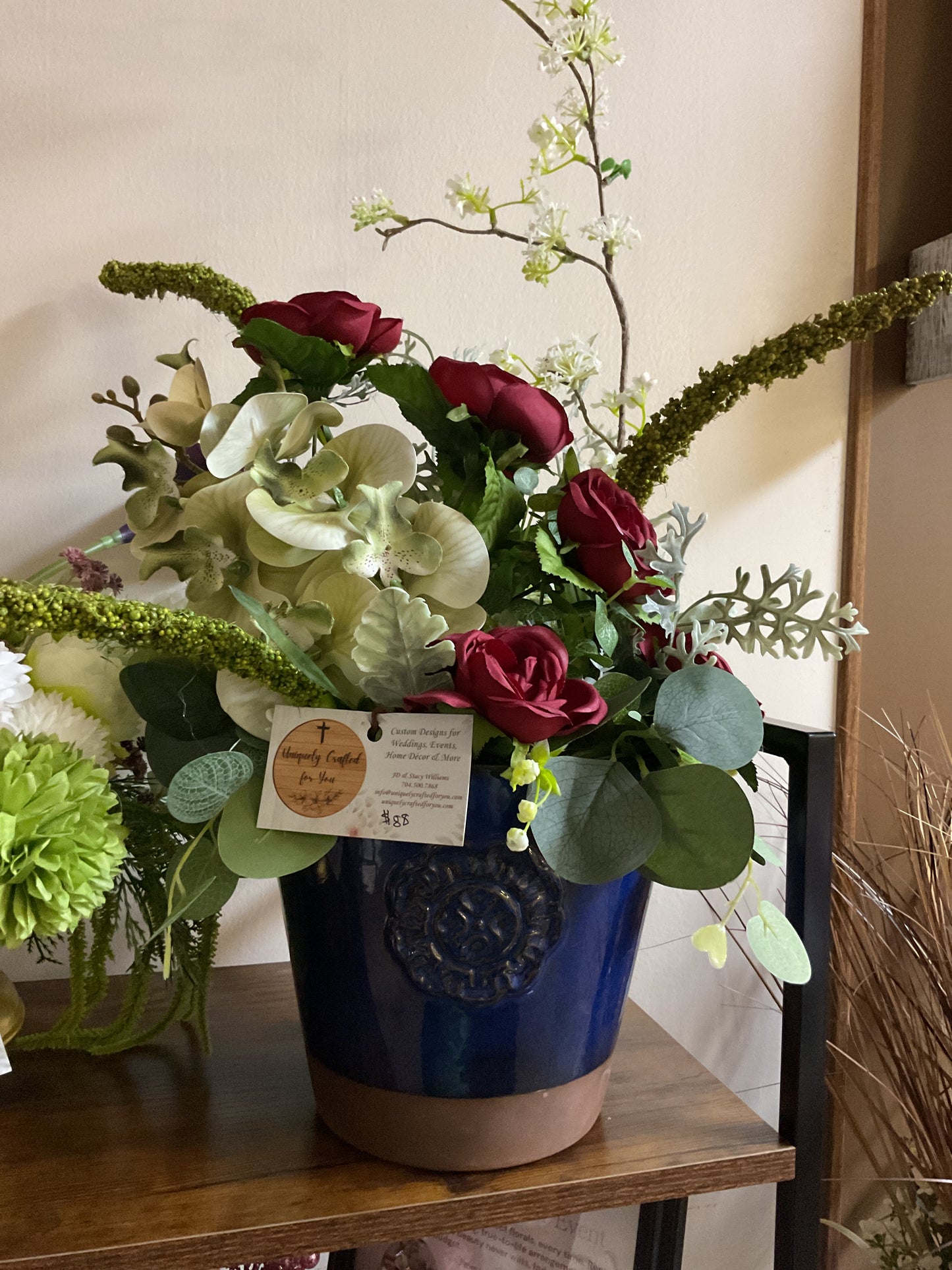 Large Blue Vase with Red and Green Flowers