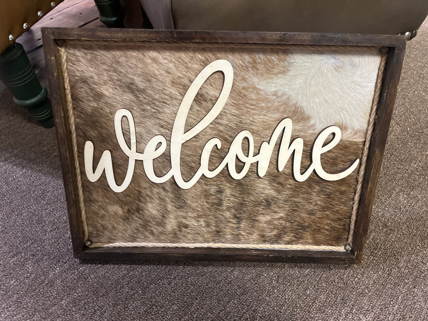 Cowhide welcome sign