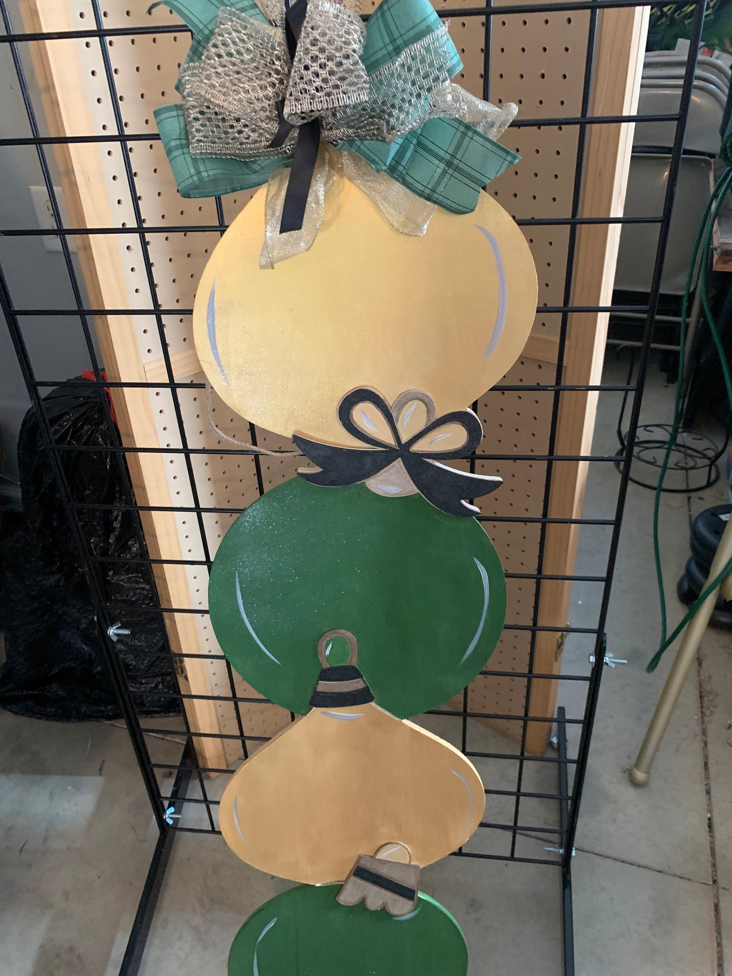 Stacked ornament leaner