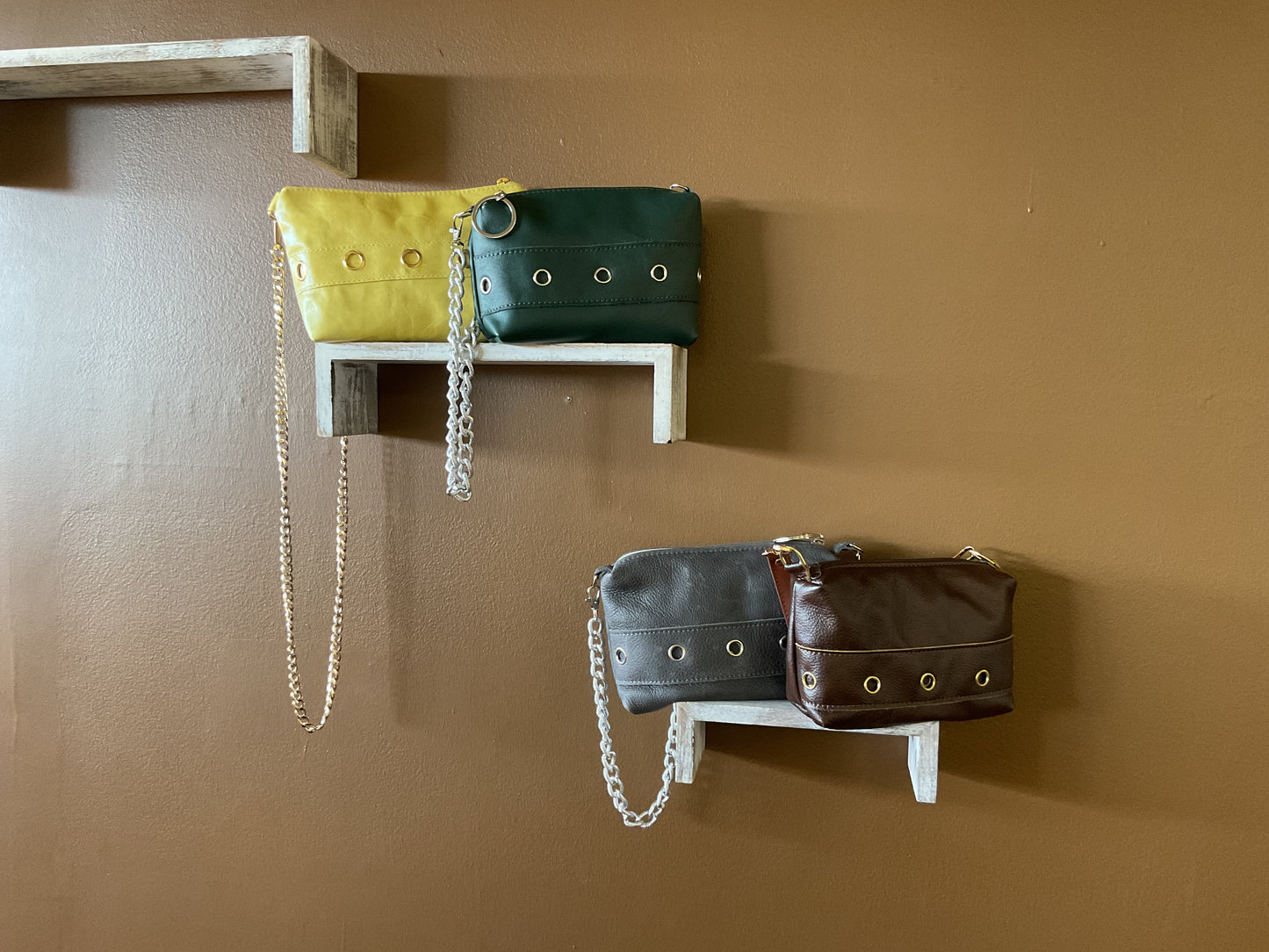 Leather grommet bags