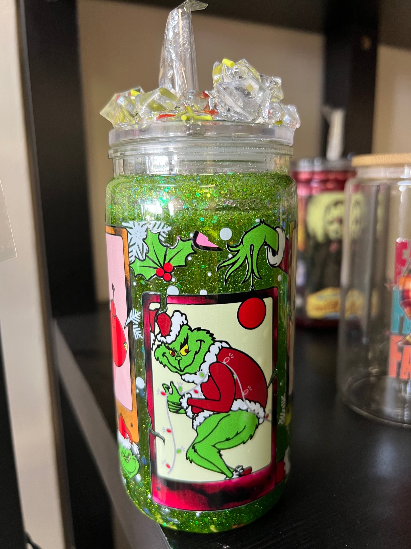 Grinch snow globe tumbler with decorated lid
